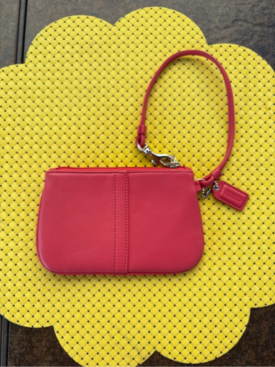 Coach Handbags - Coach Smooth Pink/Coral Leather Wristlet